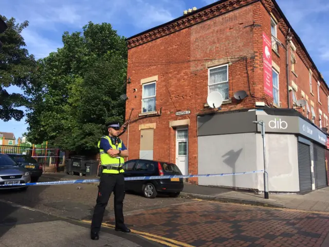 Police officer at the cordon