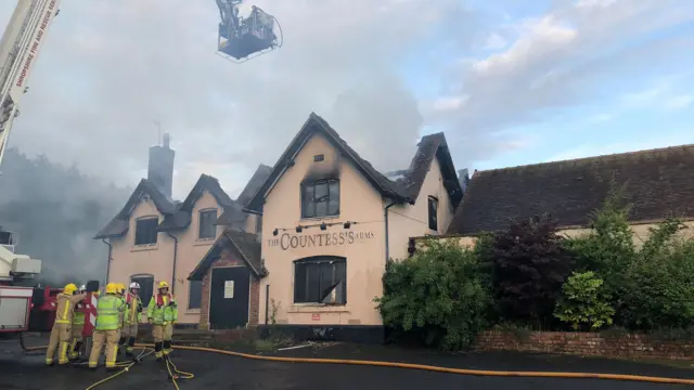 Firefighters at the Countess' Arms