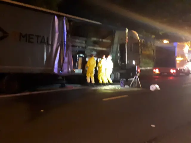 Chemical containers being removed from a lorry