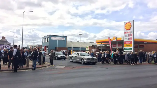 People standing in a street