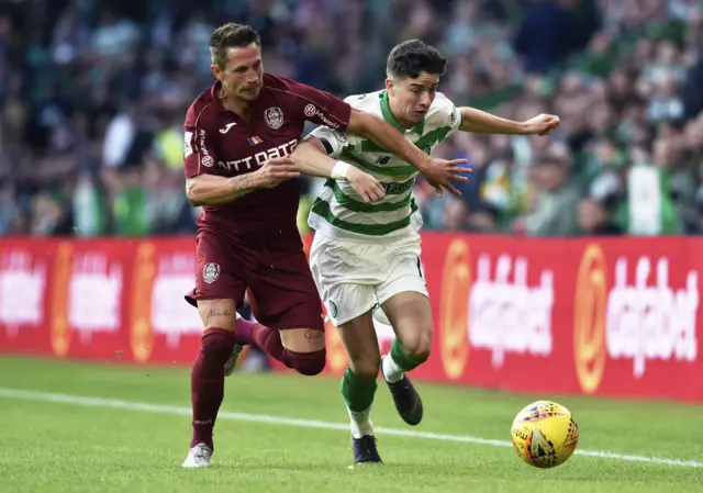 Celtic's Mikey Johnston in action with CFR Cluj's Andonie Andrei Burca