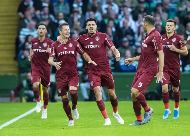 Cluj players celebrate Ciprian Deac's goal