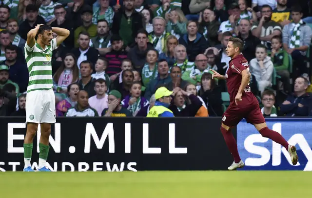 Ciprian Deac (R) wheels away in delight after making it 1-0 to CFR Cluj