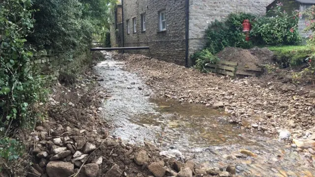 Stones and rocks left by the flooding