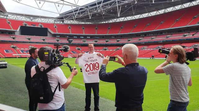 Jimmy being filmed at Wembley