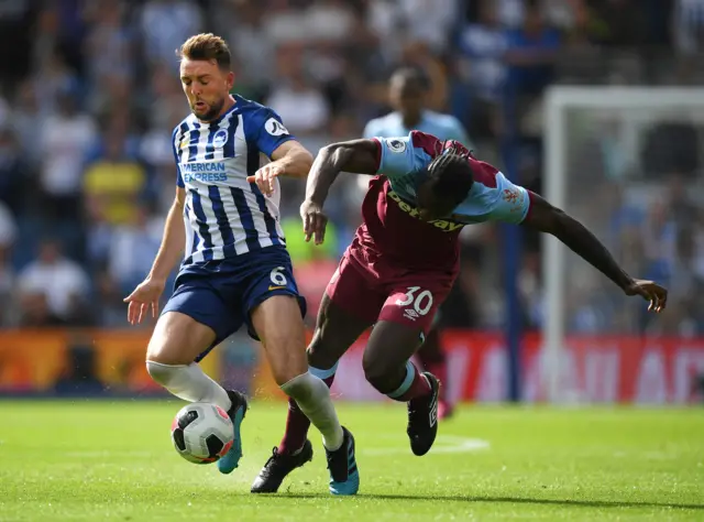 WEst Ham's Michail Antonio challenges Dale Stephens