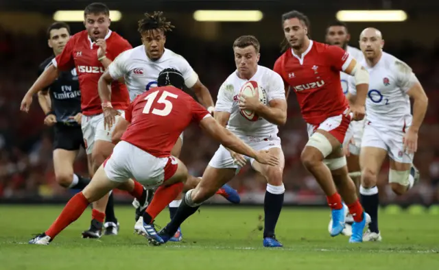 George Ford runs with the ball