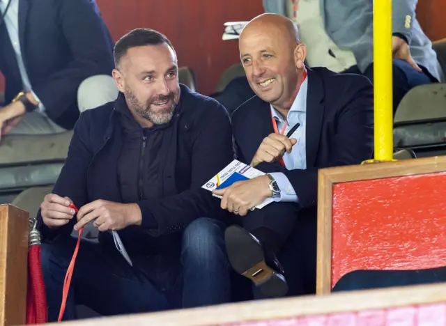 Kris Boyd and Rangers assistant Gary McAllister watching at Firhill