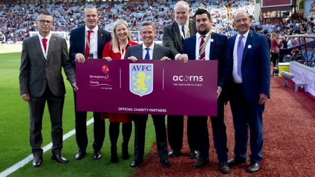 Aston Villa with charity partners