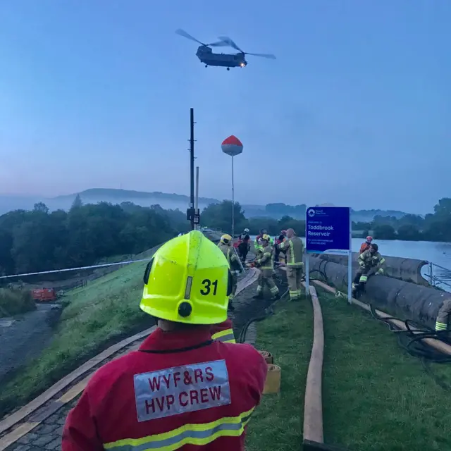 A firefighter and a helicopter