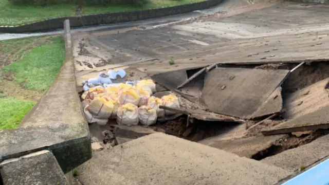 Dam wall collapsing