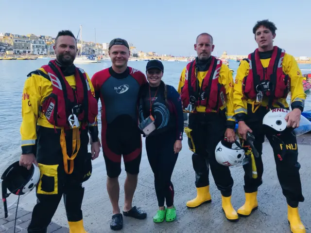 Crew returning with rescued kayakers