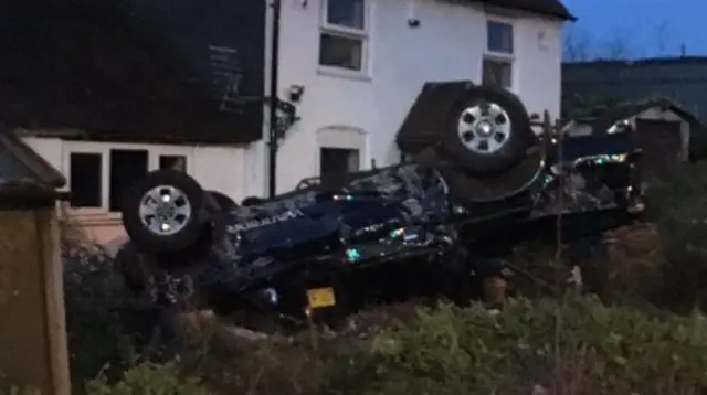 Vehicle on its roof