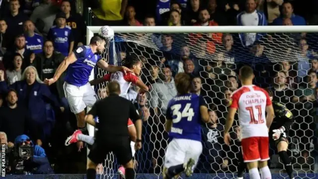 Birmingham striker Lukas Jutkiewicz scores