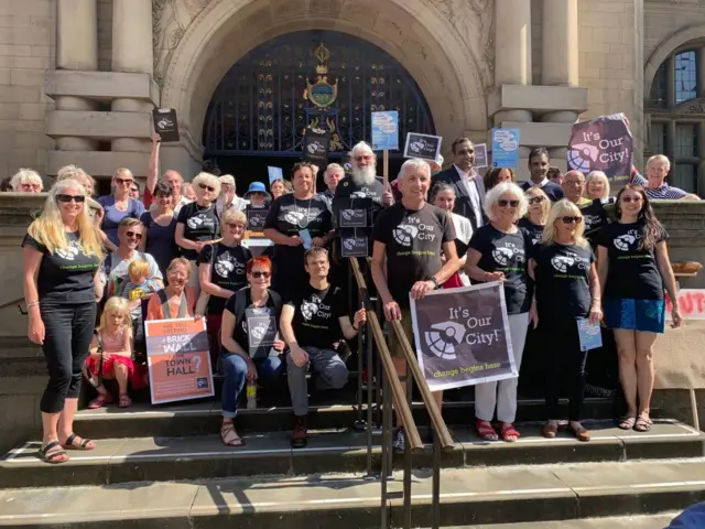 People handing in a petition