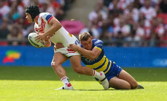 Jonny Lomax and Warrington's Declan Patton