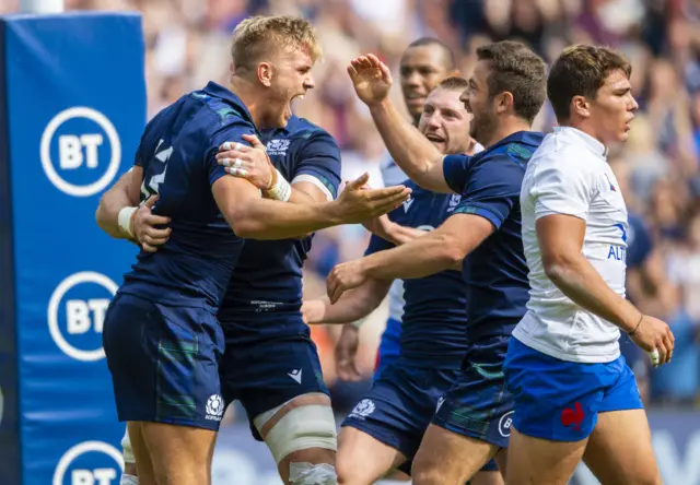 Chris Harris celebrates his try