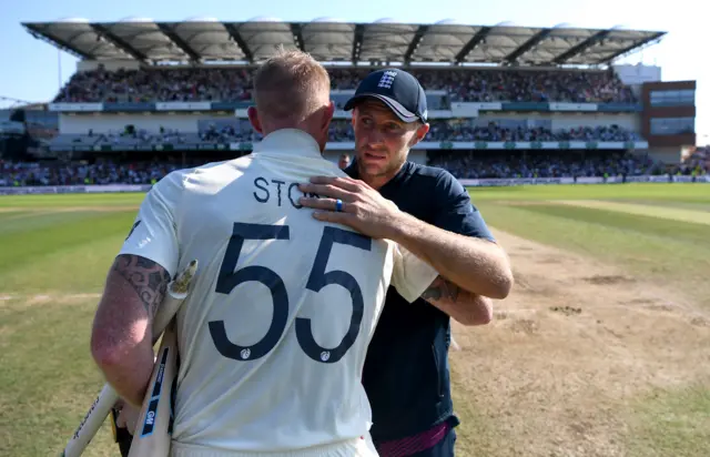 Ben Stokes of England celebrates with teammate Joe Root after hitting the winning runs to win the 3rd Specsavers Ashes Test match between England and Australia at Headingley