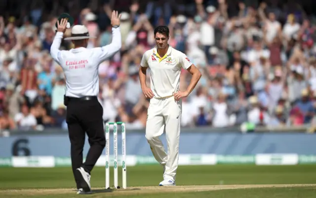 Pat Cummins of Australia is hit for six runs by Ben Stokes of England during day four of the 3rd Specsavers Ashes Test match between England and Australia at Headingley