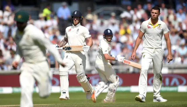 Ben Stokes and Jonathan Bairstow of England score runs from the bowling of Josh Hazlewood of Australia