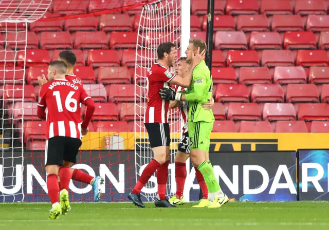 Simon Moore saves a penalty