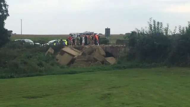 Hay demolishing bridge