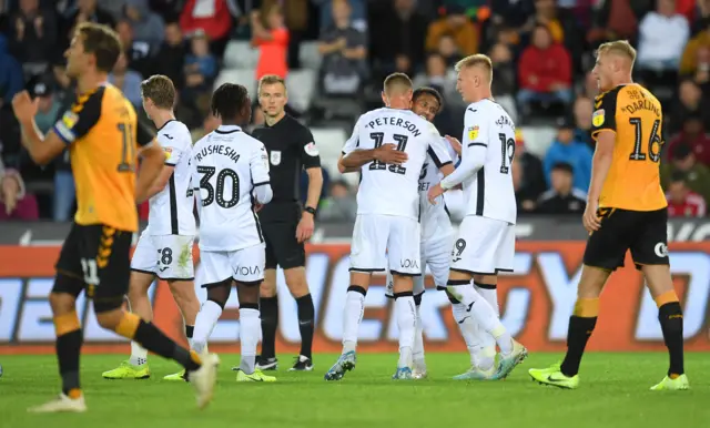 Wayne Routledge celebrates