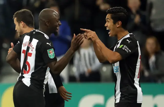 Yoshinori Muto celebrates