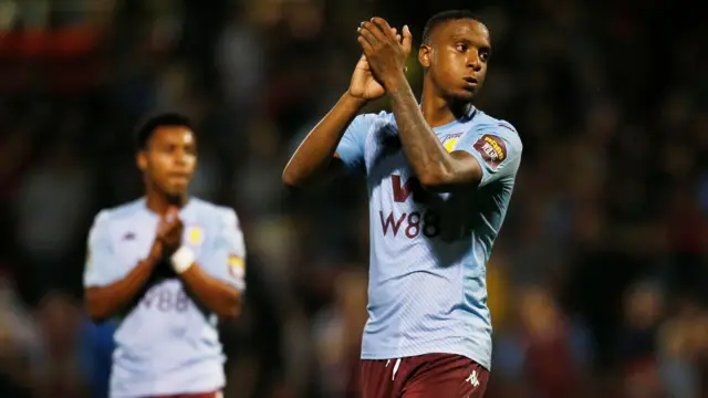 Aston Villa"s Ezri Konsa applauds fans after the match