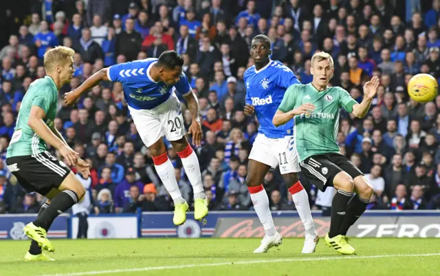 Alfredo Morelos fires in an early header at Ibrox