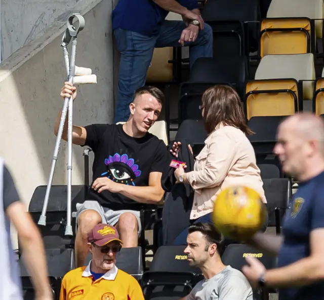 Motherwell's David Turnbull - a summer transfer target of Celtic - is watching the game from the stand