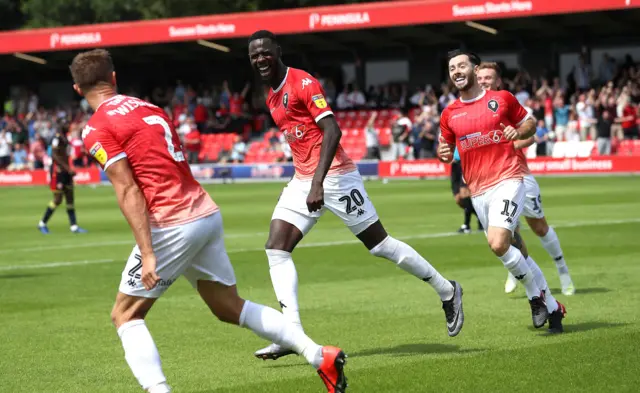 Salford celebrate their opening goal