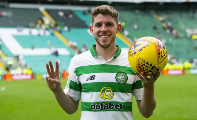 Ryan Christie with the match ball