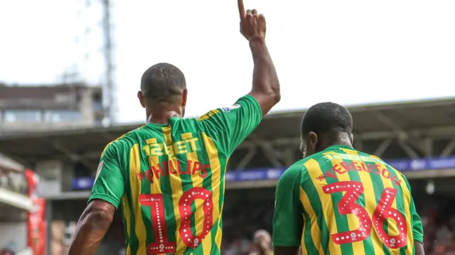 Matt Phillips (right) celebrates