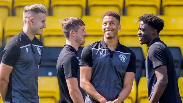 Motherwell's James Scott, Jake Carroll, and Devante Cole