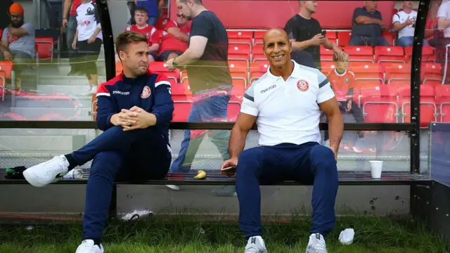 Stevenage boss Dino Maamria on the bench