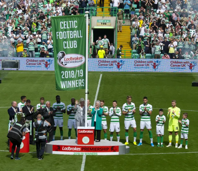 Celtic raise the flag