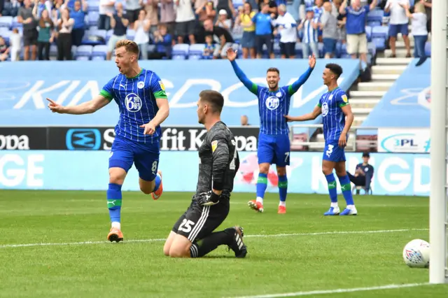 Lee Evans celebrates