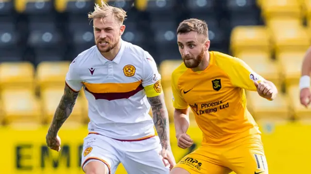 Livingston's Steven Lawless (right) in action with Motherwell's Richard Tait