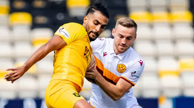 Livingston's Aymen Souda in action with Motherwell's Allan Campbell