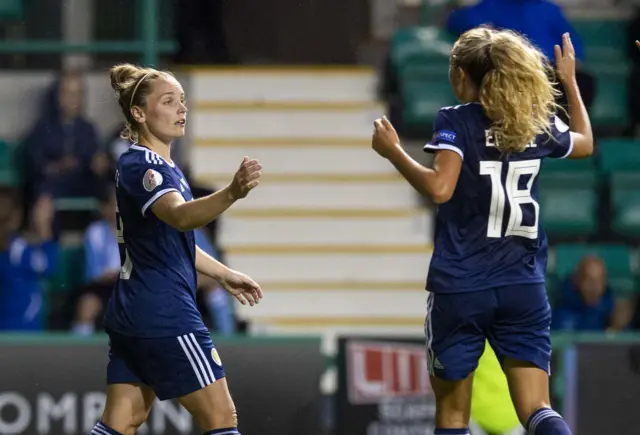 Kim Little is congratulated by Claire Emslie after making it 2-0