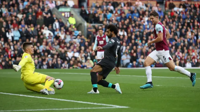 Mohamed Salah and Nick Pope