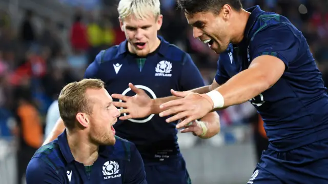 Scotland's Rory Hutchinson (left) celebrates his second try