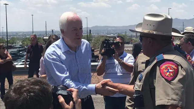 Texas Senator John Cornyn visits the scene of the attack in El Paso