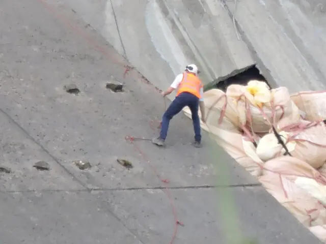 Man on spillway