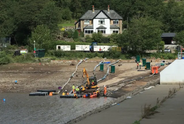 The draining of the dam