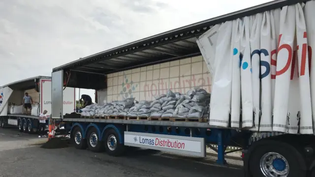 Lomas Distribution lorry with sandbags inside