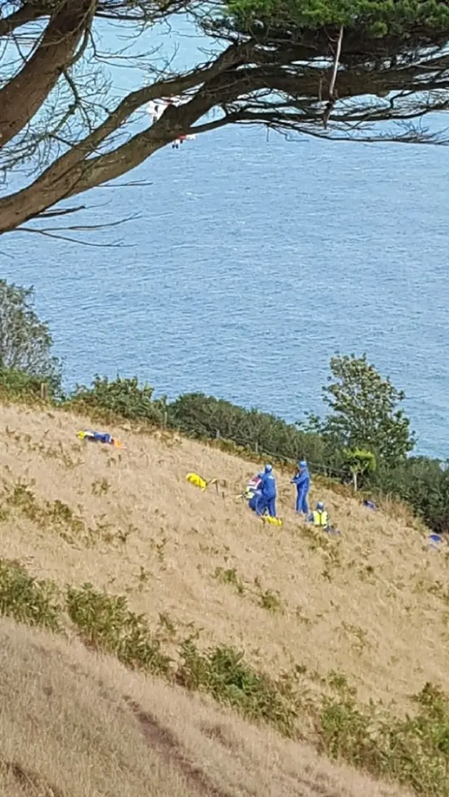 rescue team on cliff