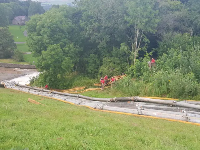 Fire fighters at Toddbrook Reservoir