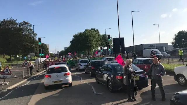 Cars stopped by protest on A38